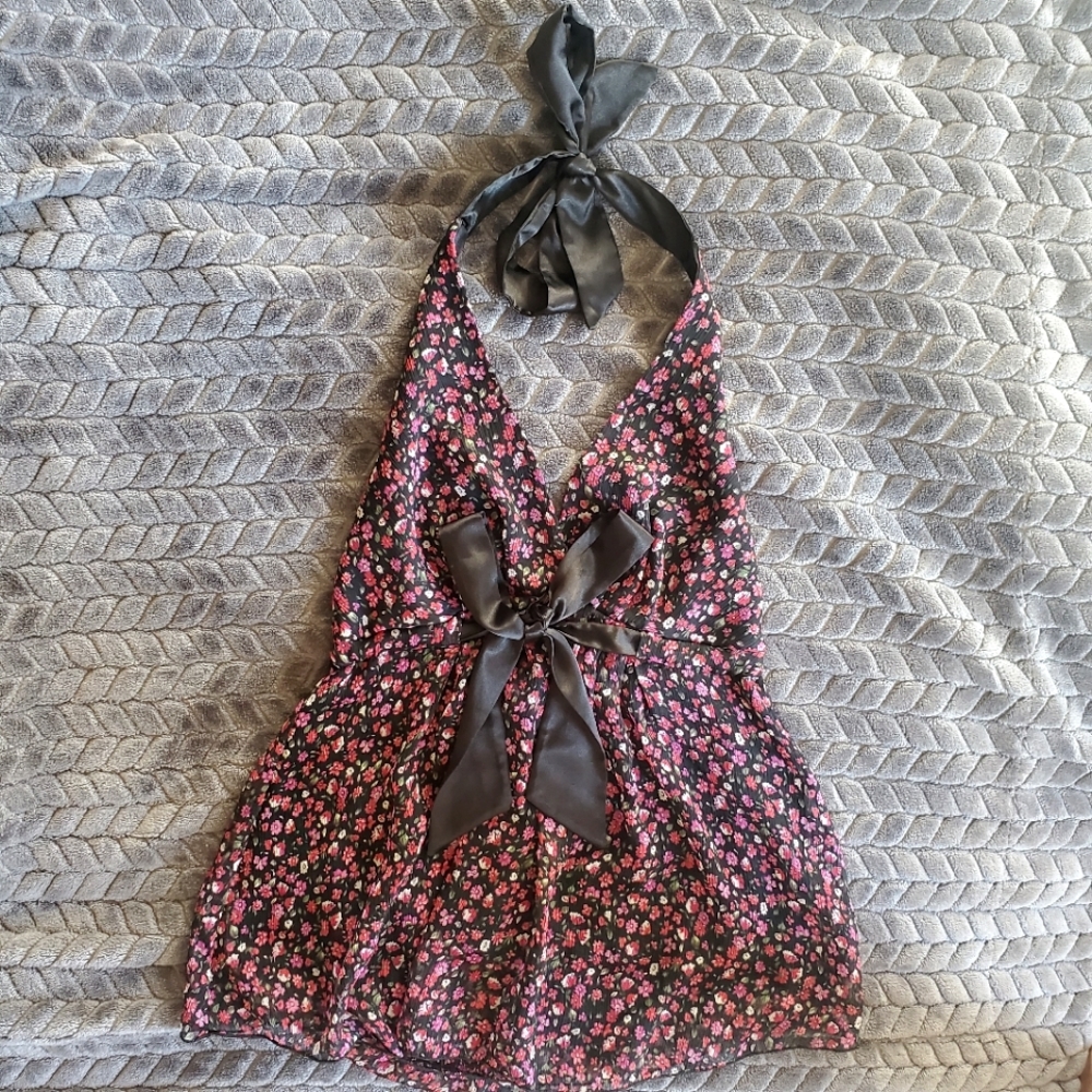 •Black floral blouse•Size small•Pre-owned gently used•No rips or stains
